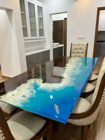7*3 realistic ocean theme dining table with upholstery& teak wood chairs and bench! contact us to order a similar table #resin  #resintable  #epoxy  #epoxyresintable  #epoxycoating  #epoxydining  #epoxyfurniture  #Homedecore  #epoxytablekerala  #clocks  #InteriorDesigner  #epoxytables  #resintable  #resinart  #teakwood  #TeakWoodDoors  #Teapoys  #CoffeeTable  #teak_wood  #teakwoodchair  #eastindiawalnut  #ocean  #oceandecor
