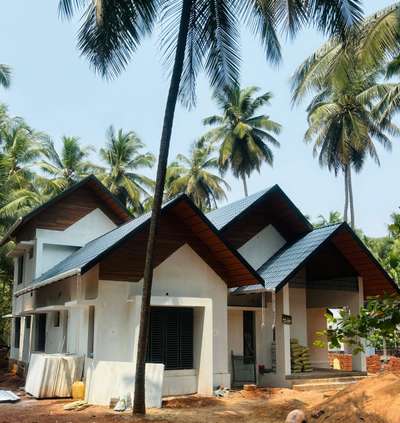 Client : Muhammed musthafa 
Site : Cherugoli, mangalpady
District : Uppala, Kasargod 
Roof tile: Tapco
Qty : 2448nos
Sealing tile : Star flat
Qty: 3600
Gutter : Euroguard
Size: 6inch
Color : White  #MixedRoofHouse  #RoofingIdeas  #RoofingShingles  #RoofingDesigns  #ClayRoofTiles  #SteelRoofing