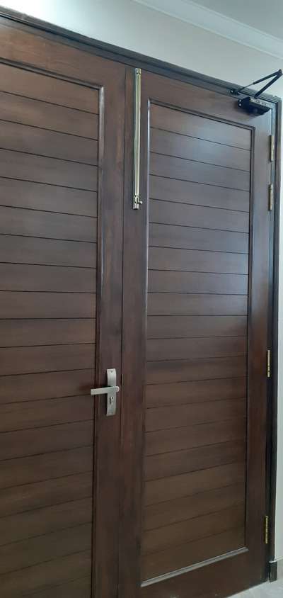 Wooden door style..👍
.
 #soliddoors 
 #GlassDoors 
 #DoubleDoor 
 #FrontDoor 
 #solidsurface 
 #InteriorDesigner