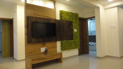 #tvunit#vennercombination#livelylivingroom#greenery#interiordesign#dizzartinteriors