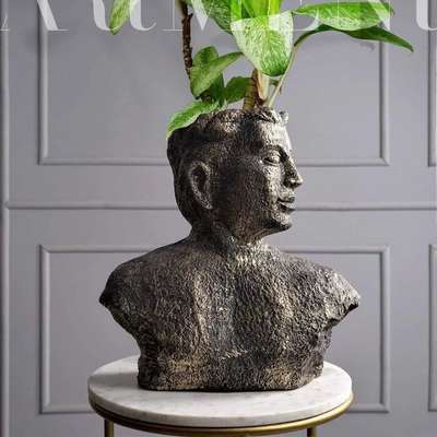 Let Your Decor Make A Statement!

The Surreal Bronze Man Table Accent is an innovative way of decorating your house in a classy manner.
This accent will make your decor stand out.
Inspired by surrealism, this piece makes us think about the different perspectives of the artist.
#planters are #planters #plants #homedecor #garden #plantsofinstagram #gardening #pots #indoorplants #theartment #decorshopping