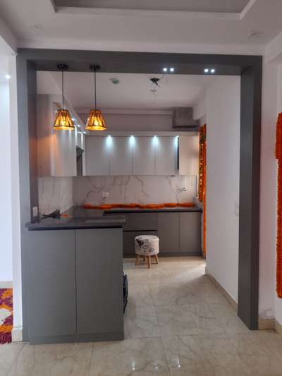 modular kitchen 
with grenite stone & wooden paneling