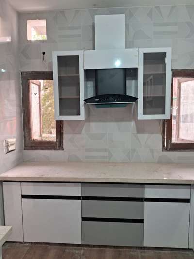 Modular kitchen 
by " Rishi home interior modular kitchen & Furniture "