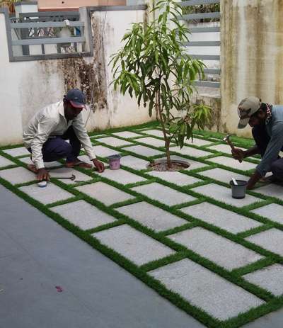 stone pawing & artificial grass setting