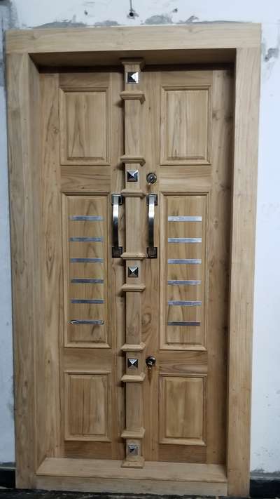 Teakwood Main door design 
#door #maindoor #DoubleDoor  #thondutharayilfurnituremart #karukachal  #teakwoodfurniture #TeakWoodDoors