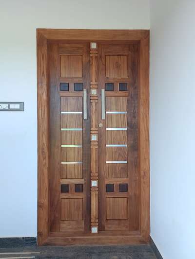 #frontdoors #DoubleDoor #Designs #teak_wood #vastuvidya #keralastyle