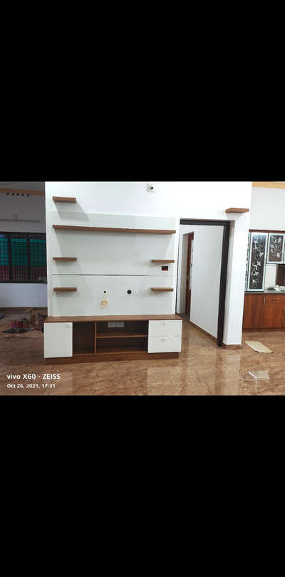 Site : Arimbur
Material used:
Marine plywood with lamination
Contact 8086349661
 #TVStand  #WardrobeDesigns  #PrayerCorner  #StudyRoom  #showcase  #bedcots  #InteriorDesigner