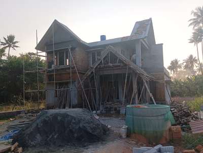 #SlopingRoofHouse #concreteconstruction #perumbavoor #doublestory
