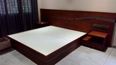 designed bed
Calicut
 #BedroomDecor  #wood
 #bed  #HouseDesigns  #Designs  #HomeDecor  #homesweethome