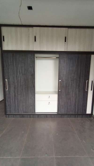 sliding door wardrobe: 
material- 710 marine plywood and merino laminate , hafele fittings
site : thodupuzha
