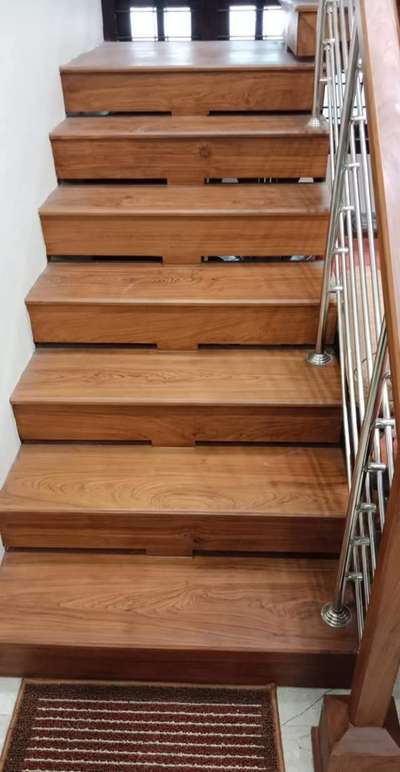 Staircase worked by marine plywood final finish by Teakwood polish finish