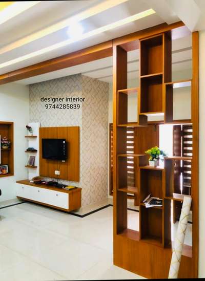 #Partition & Tv unit
Designer interior 
9744285839