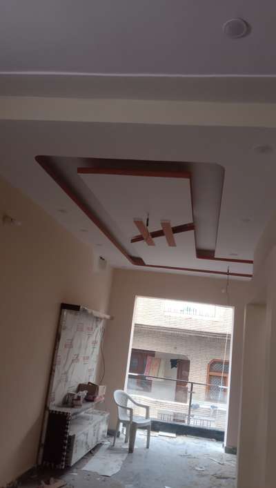 pop falls ceilings by MASU Association faridabad
 building construction with finished