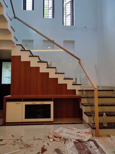 Tv unit under in staircase
finishing multi wood + Mica