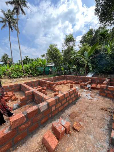 Wall construction using Laterite stone or Kannur stone. 🧱 

 #constructionsite  #sitevisit #lateritestone #wallconstruction