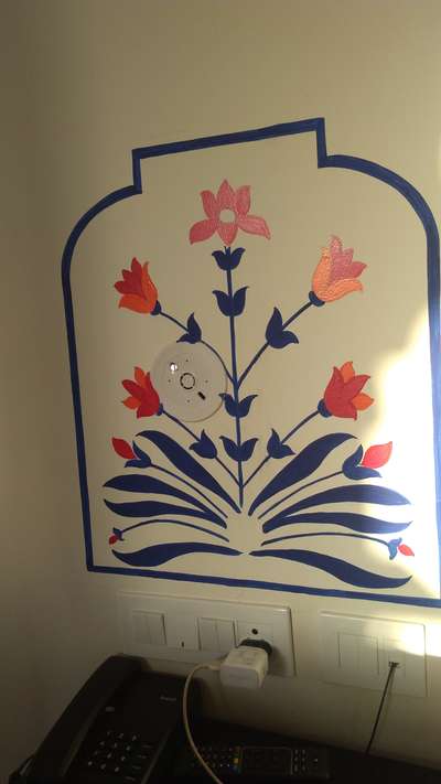 A wall painting near bed