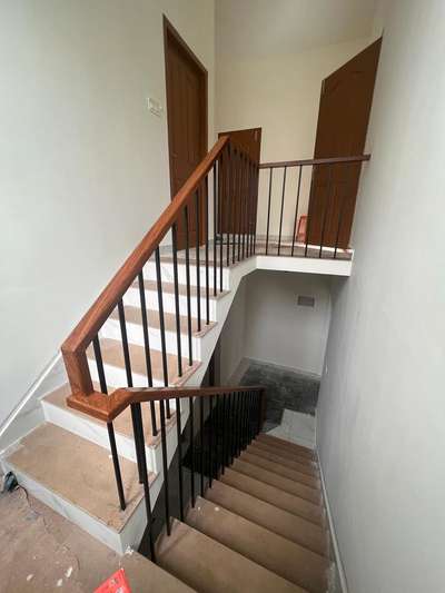industrial with wood handrail finished stair