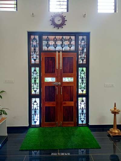 Main door with iron frame and wooden doors , windows shutter.
 #maindoor #DoubleDoor  #DoorsIdeas  #doorsdesign  #DOOR+FRAME  #DoorDesigns