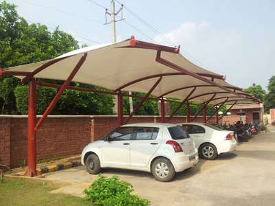 *tensile structure *
tensile car parking and shafe with ms frame decco and febric work complete