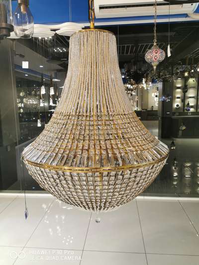 This beautiful crystal Chandelier is an extravagant stairway light full of stunning elegant details. The subtle gold added to the clear crystal base gives it a very unique look that it embodies.

 Check out all our beautiful lighting fixtures.. visit our showroom !!!!
For more info - 
9072379999