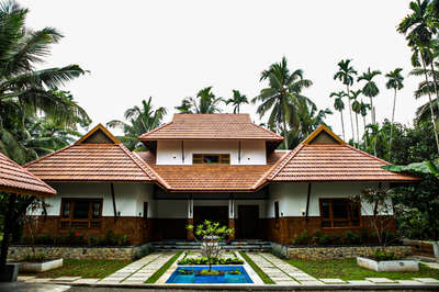 #5dotsarchitecture #LandscapeDesign  #naturalstones  #tandurstone  #KeralaStyleHouse  #LandscapeGarden  #tropical  #budgetindiandesigners
