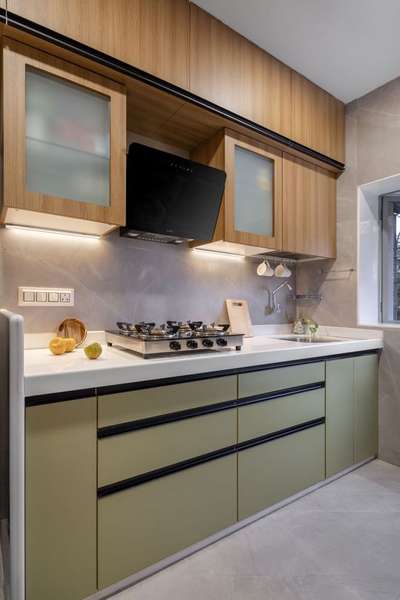 Modern kitchen designed in Paschim Vihar. 
#ModularKitchen #modernkitchens #pastel #kichendesign #profilehandles #flutedglass #imteriordesign #luxurykitchen #hettich #profilelights