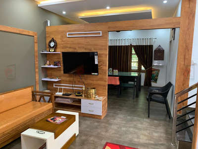 living room partition with TV Unit!

 #LivingroomDesigns  #LivingRoomTVCabinet  #tvunit  #livingpartition  #partition  #LivingRoomPainting  #interiorcontractors  #keralastyle