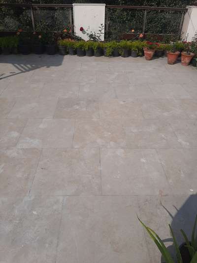 water proofing work with 3mm group cutting of the old kota stone work at terrace