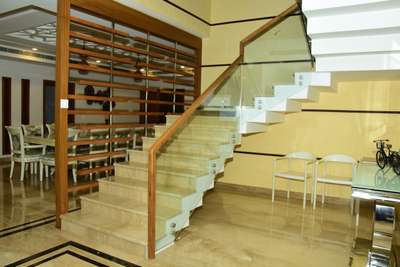 toughende glass handrail with teakwood toprail