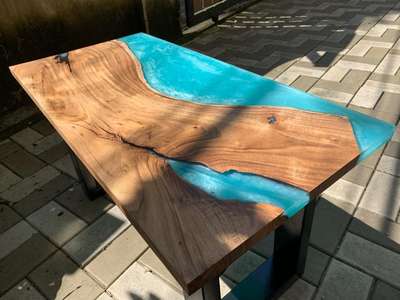 40-year old Asian Walnut with sky blue epoxy base and depth effect. Size of 3 feet x 1.5 feet with both matte and gloss finish! 

#LivingRoomTable  #CoffeeTable
 #InteriorDesigner #epoxytables 
 #keralaarchitectures  #HomeDecor #homedecoration 
 #DiningTable