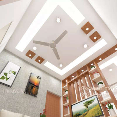 Home interior project in chengannur.
skywood interiors - Thiruvalla.
8921596939.
# partition.
# T. v unit.
# Modular kitchen.
Gypsum ceiling.