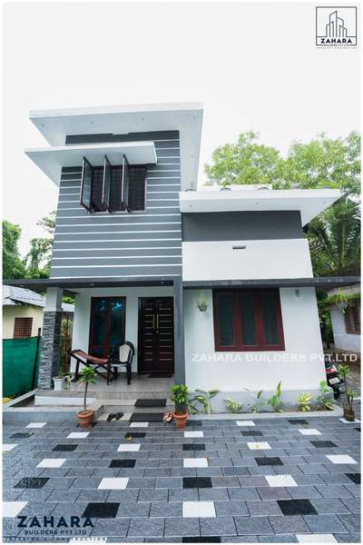 Job No: 124 🏡
Name : Mr Lithin Roy
Area : 1200 SQ.FT
Elevation : Contemporary 
Place : kalavoor, Alappuzha

 #keralahomeplanners #freehomeplans #homedesign #homesweethome #homedesigner #budgethomes #BuildersandDevelopers #buildersinkochi #bestbuilders #contemporaryhomedesign #budgethomepackages #interior #elevationdesign #zaharabuilders #traditionalhome #homedecor #villas #residential #modernhousedesign