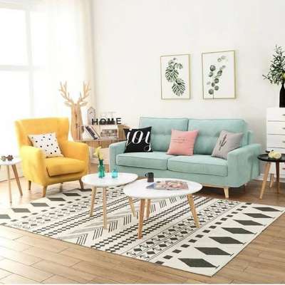 Lets add some colours to the white living room with an electric blue sofa, bright yellow cushioned wing chair, cushions of different shades and a B&W geometric rug. Leaf paintings on the wall, and plants bring a touch of greenery to the room.
#interior #decor #ideas #home #interiordesign #indian #colourful #decorshopping