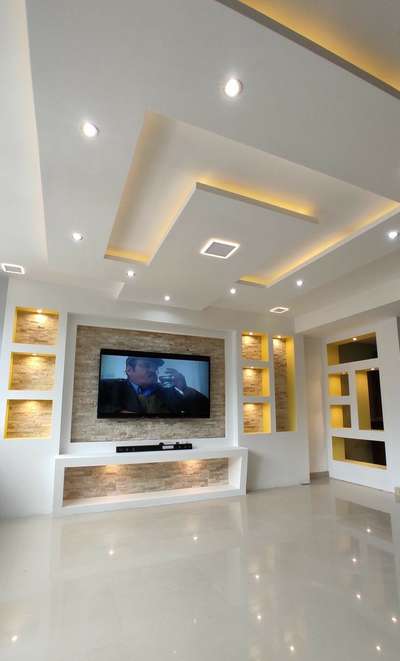 beautiful living room fals ceiling
and Tv unit wall

Do you want to make your own design like this
#khadija'h #Interior
call 9340091335