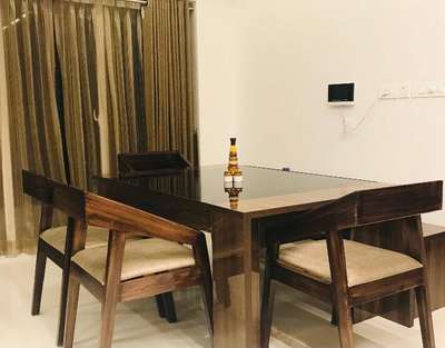 Dining Table-Marine Ply and Chairs with Teak stained to match laminate shade # Skyline #
SILENT VALLEY INTERIORS since 1999 # 9446444810 #