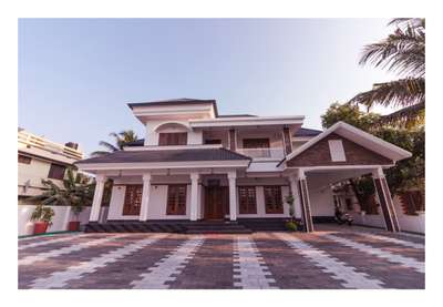 kerala house design 4000 sqrt  #TraditionalHouse +colonial