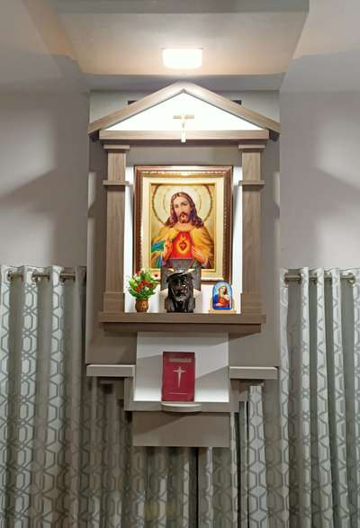 A wall mounted prayer Unit above window