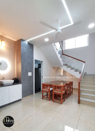 Dining Area
#Completedproject #kochi  #InteriorDesigner #StaircaseDesigns #glassrailings #profileceiling #profilelighting #washarea #charcoalpanels