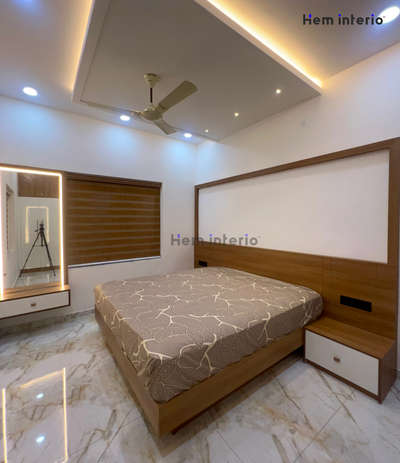 Bedroom interior

 #bedroominterior #cot #bedsidetable #cielingdesign #flooringdesign #mirrorunitdesign