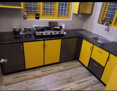 yellow and grey detailing
kitchen cupboards
 #aluminumworks  #fabfurnishers 
 #color 
#colorglass  #colourfulcurtain