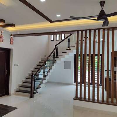 Interior 
client  Mr Arun 

 #concept  #architecture   #interior  #Residence  #LivingRoomTVCabinet  #StaircaseDesigns  #cladding  #lateritestone