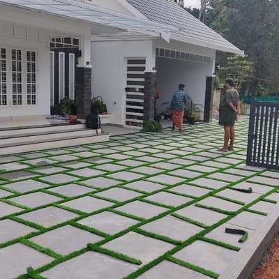 Tandur stone paving with artificial grass.