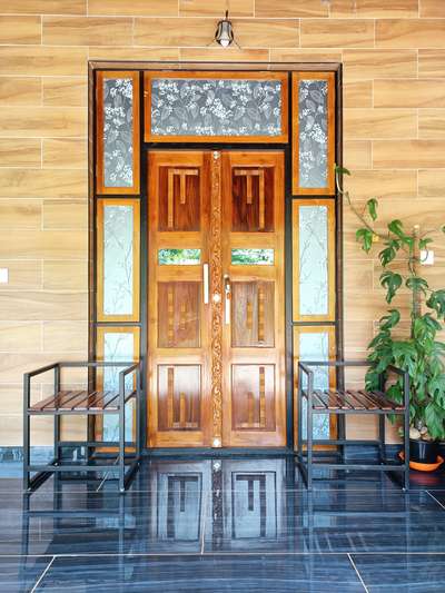 Main entrance (Iron frame with wooden door & windows). #Entrance  #maindoor  #maintainence  #doorframe  #mssteelfabrications #DoubleDoor #TeakWoodDoors
