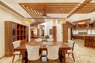 #diningarea  #woodendesign #woodenfinish  #WoodenCeiling #diningtable  #woodenchairs 
 #LUXURY_INTERIOR  #interiorstylist