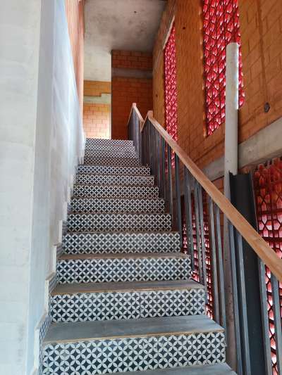 #staircase #StaircaseDesigns #designertiles #Woodenhandrail #cseb #mudblock #architecture #keralaarchitecture #vernaculararchitecture #sustainable