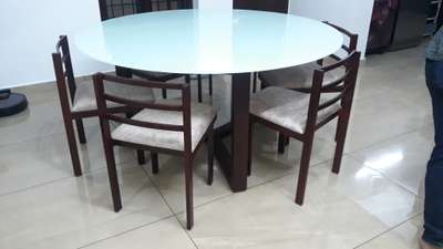 Glass topped round table set