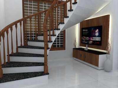 tv unit under spiral stairs.. pull out TV model.