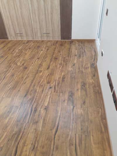 wooden flooring done by us in Noida.