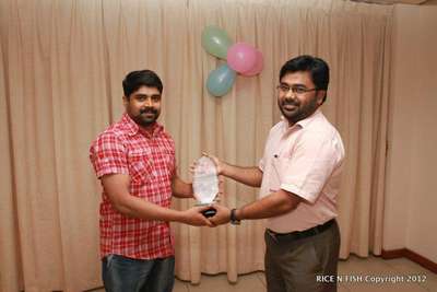 Receiving a momento of appreciation from one of my prestigious client,
Rice n Fish Restaurant
Valayamkulam.