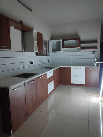 modular kitchen . varapuzha ,
client name . Faisal